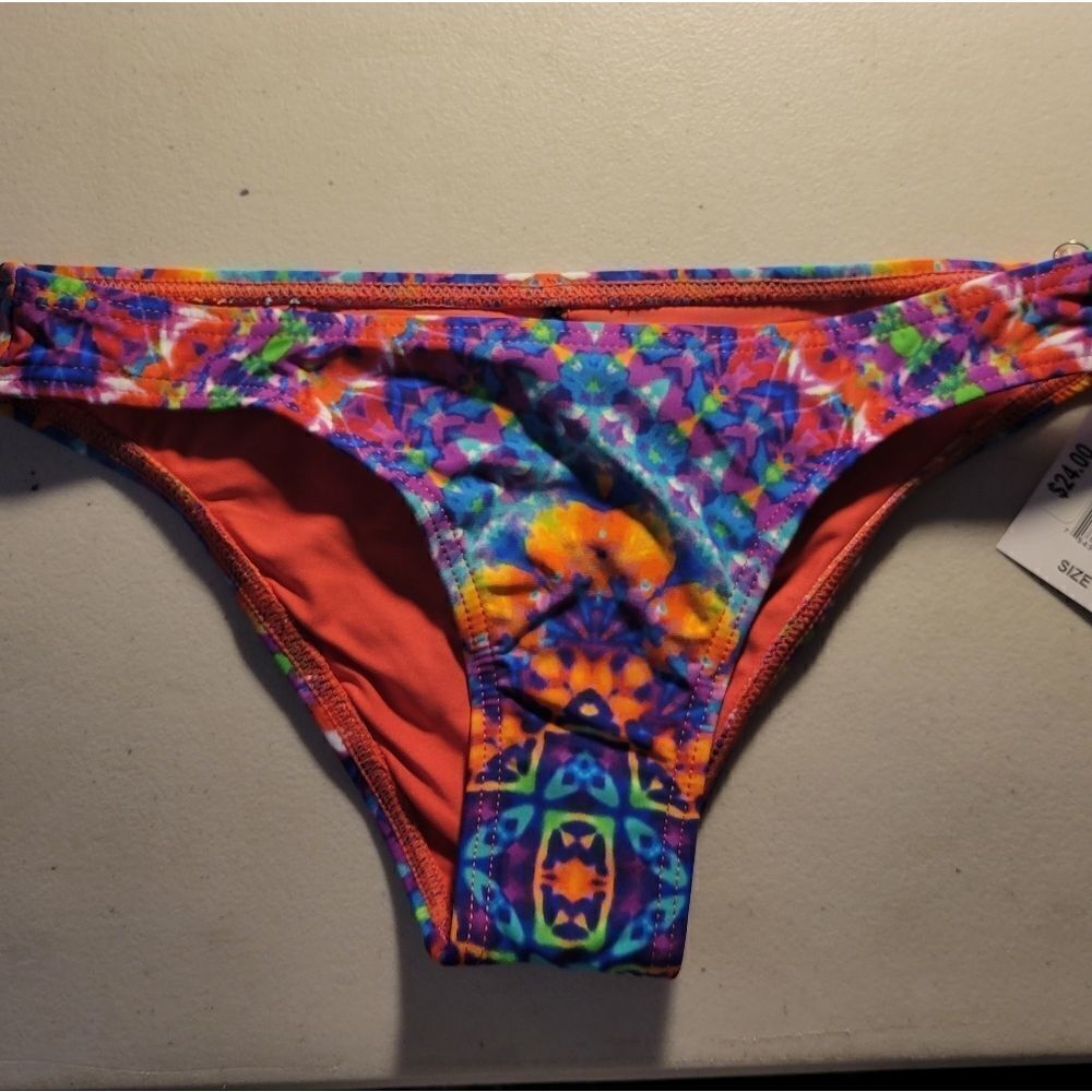"KikiRio " Woman's tie dye bikini Bottoms Size: XS hygienic liner NWT
